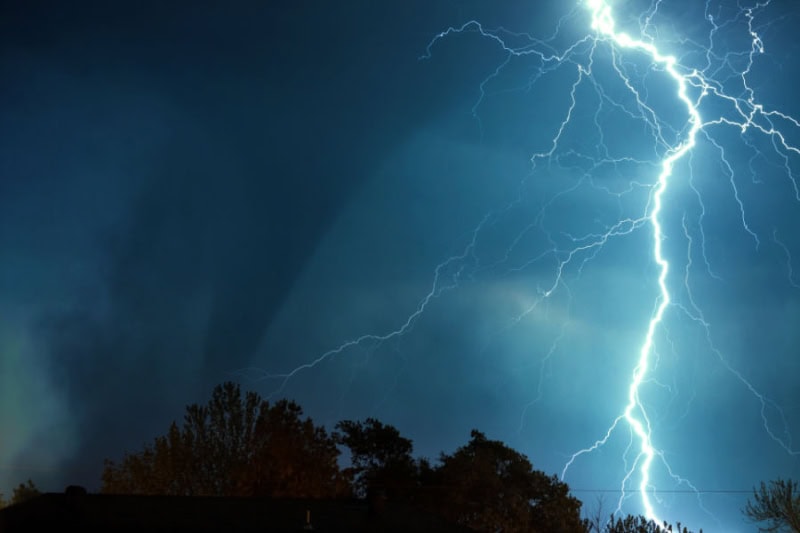 How Do I Prepare My HVAC System for a Hurricane? A lightning strike in the sky.